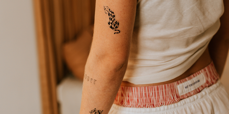 Tatuagens no braço superior
