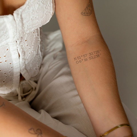 Tatuagem de coordenadas